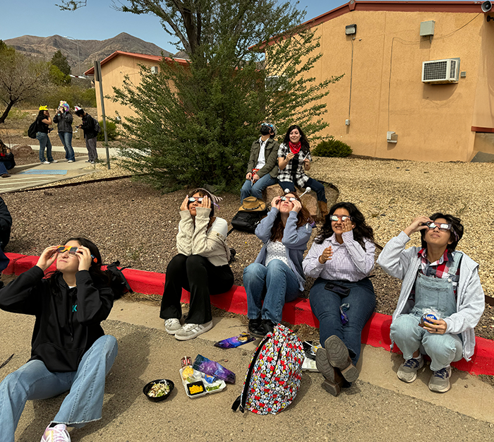  student observing solar eclipse