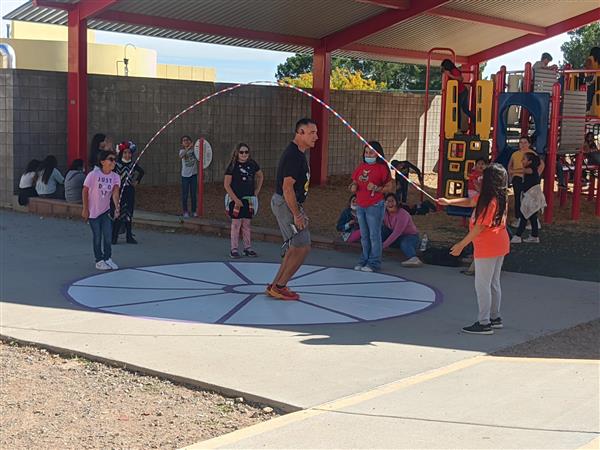 Coach Gutierrez enjoying recess 